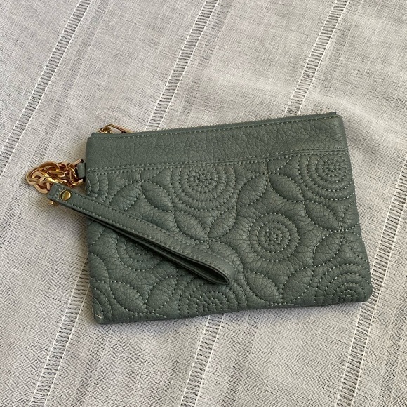 Deux Lux quilted wristlet with gold embellishments. - Picture 1 of 11